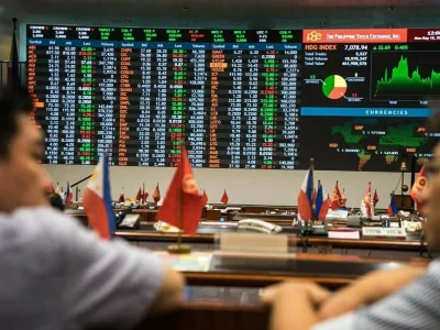 In a quiet holiday trade, Asian markets are flat