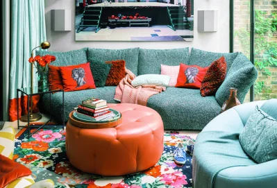 Opt for cushions and blankets in warm colors