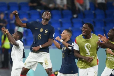 French team celebrate after scoring goal against Denmark 